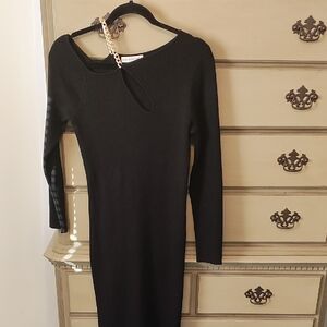 And Now This Elegant Black Knit Dress gold chain detailing